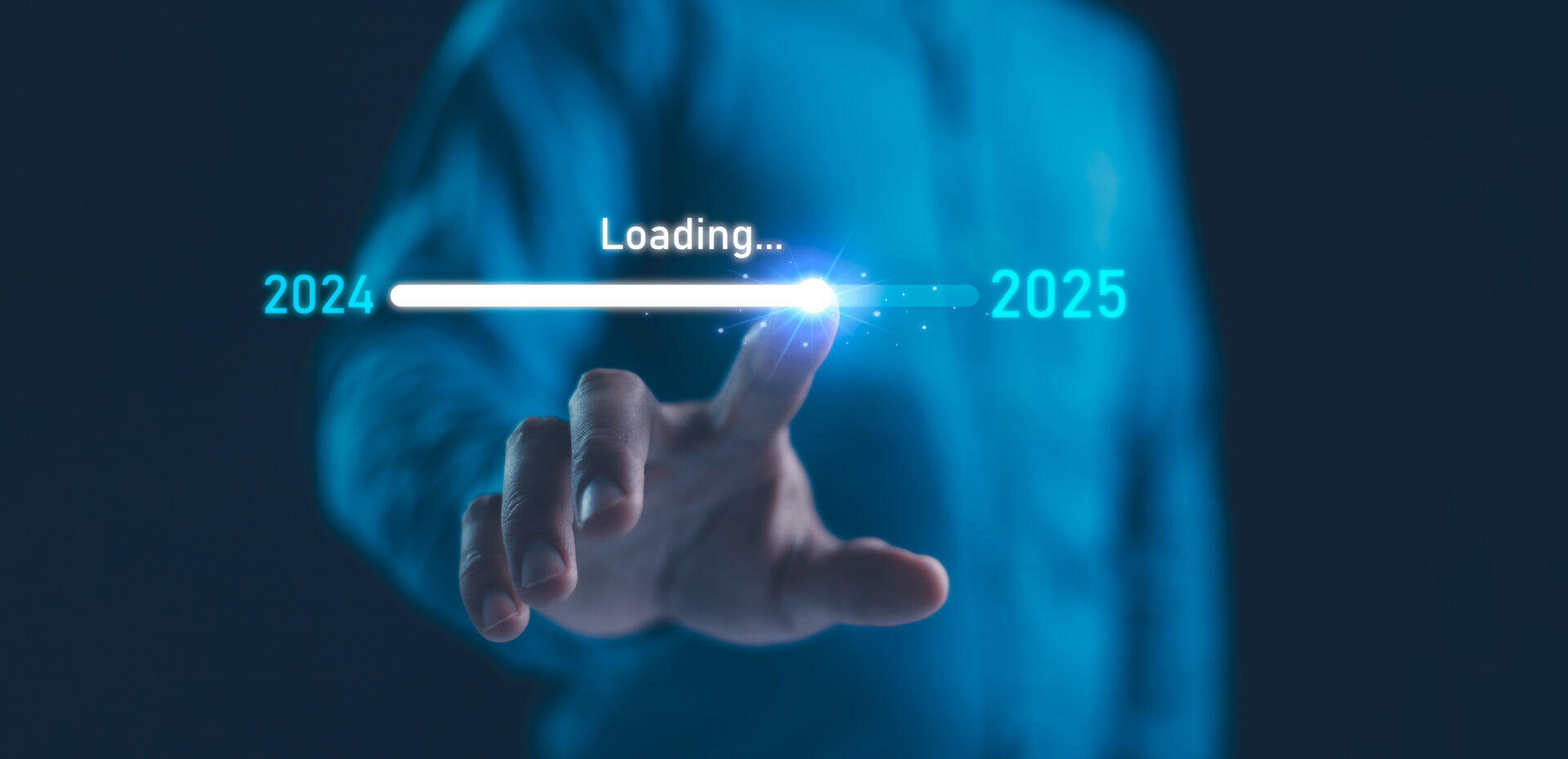 A picture of a man moving a dial from 2024 to 2025