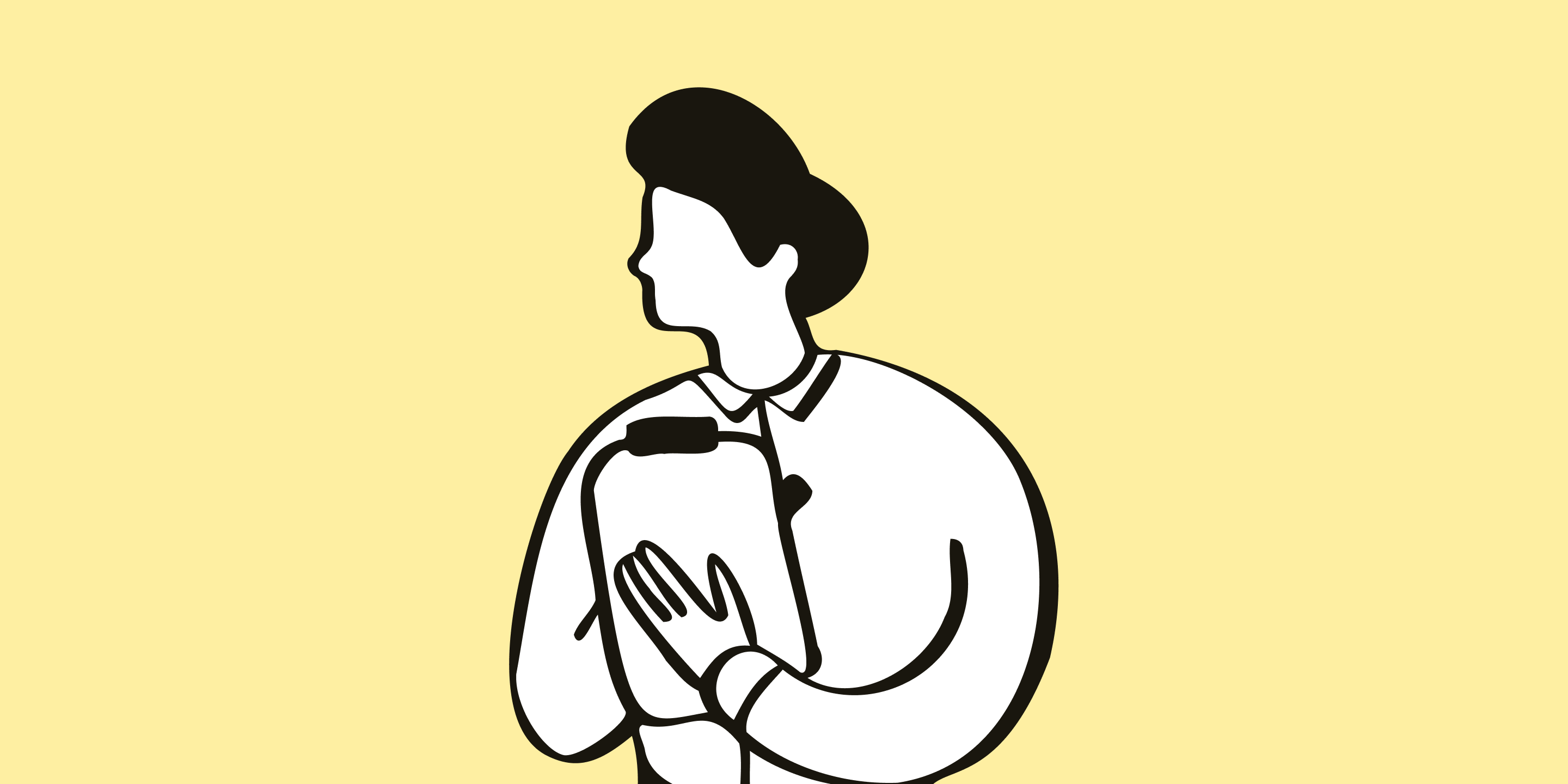 A person writing notes, illustrating the hands-on process of planning and creating purposeful content for a charity audience.