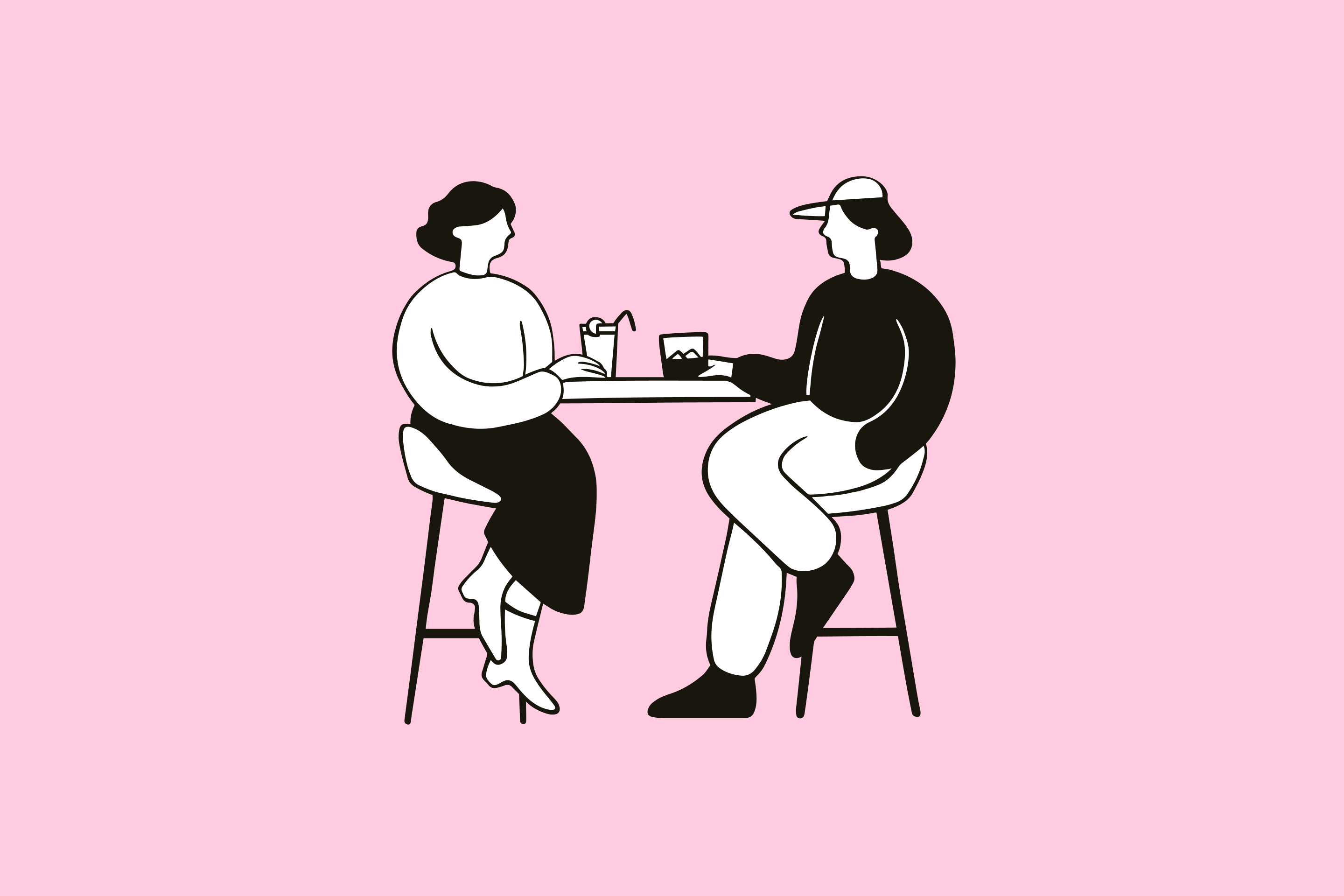 Two people talking together, illustrating how open communication and shared knowledge within a charity team helps ensure brand consistency across every touchpoint and channel.